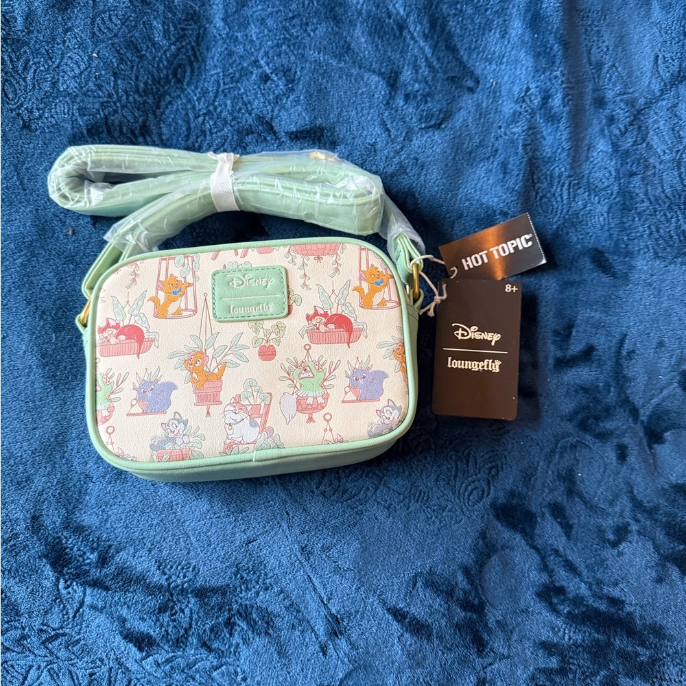 Disney Loungefly Bag with Green and Red Cartoon Design